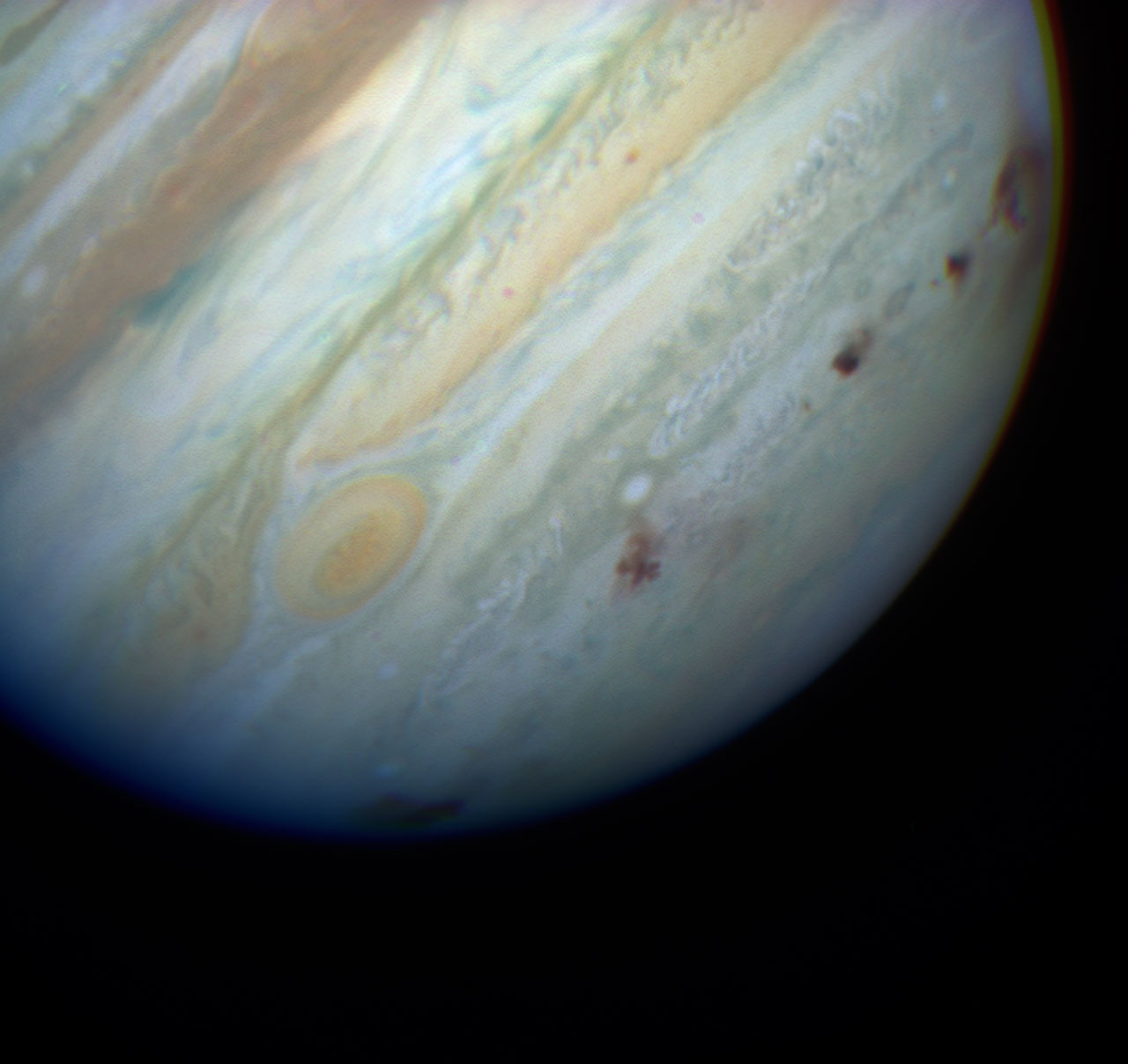 Impact zones on Jupiter created by the Comet Shoemaker-Levy 9, as seen by the Hubble Space Telescope. Eight impact sites are visible. Credit: Hubble Space Telescope Comet Team and NASA/ESA
