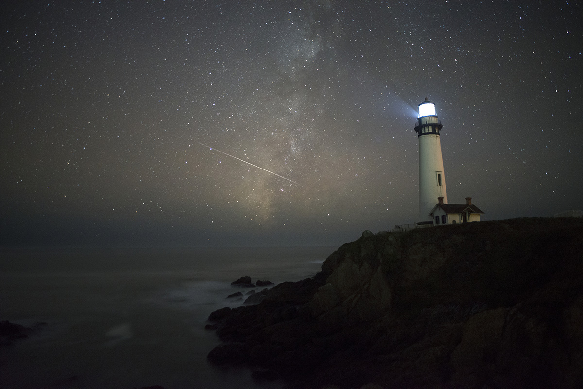 An Orionid meteor in the sky near Pigeon Point Lighthouse, California. Credit: Mountain Light Photography Inc / Getty