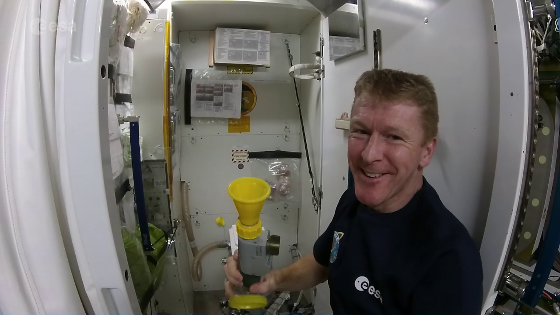 Tim Peake pictured with the toilet onboard the International Space Station. Credit: NASA/ESA