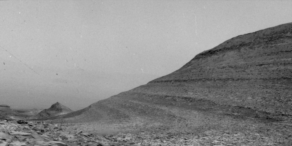 Specks in this image were caused by charged particles from a solar storm hitting one of the navigation cameras aboard NASA's Curiosity Mars rover. Credit: NASA/JPL-Caltech