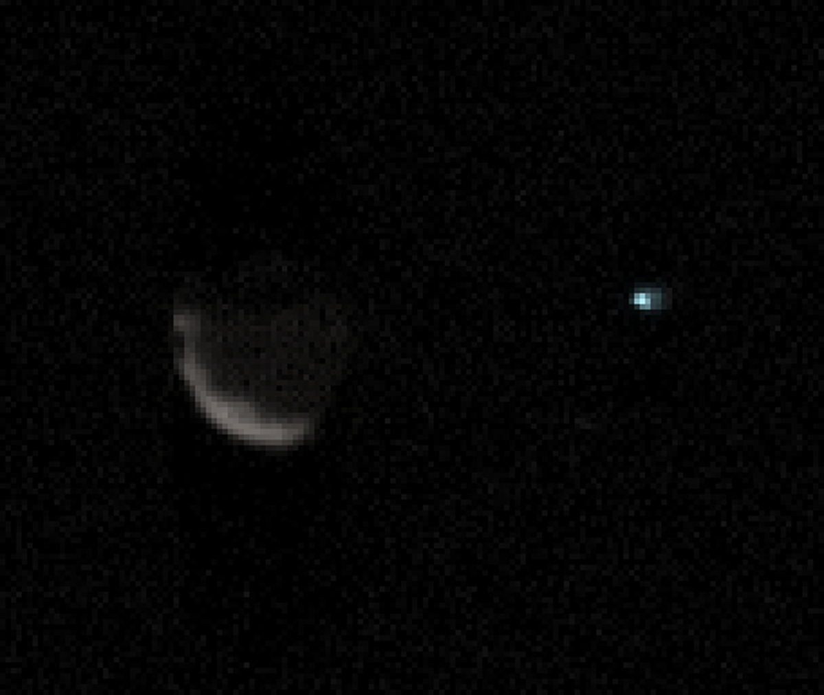 A view of Mars moon Phobos (left) and Earth (right captured from the surface of Mars by NASA's Curiosity rover. Credit: NASA/JPL-Caltech/MSSS