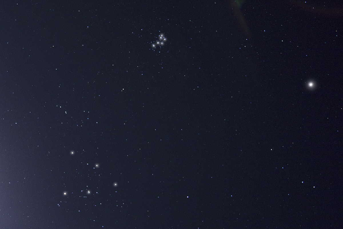 The Pleiades (top) and the Hyades star cluster (bottom left). Credit: Pete Lawrence