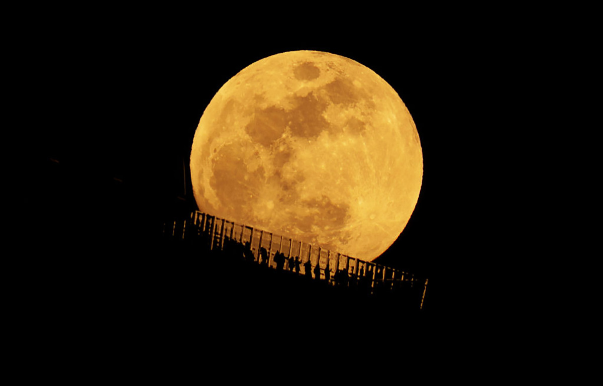 The 2026 Worm Moon rises behind the Edge outdoor observation deck at Hudson Yards in New York City, 2 March 2026. Credit: Gary Hershorn/Getty Images