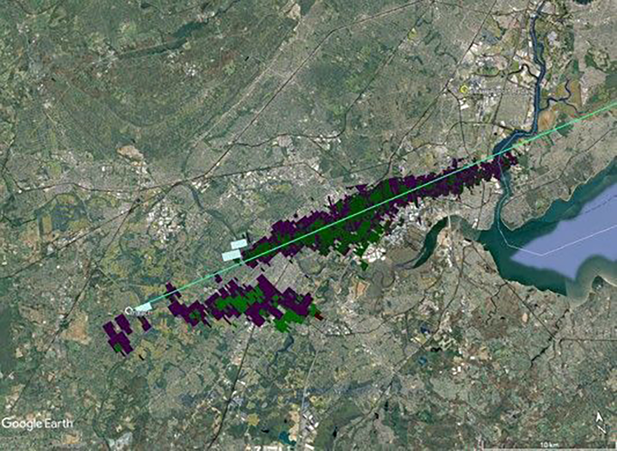 Radar detections show the path of the Hillsborough meteorite (the green line) as it hurtled through Earth's atmosphere. Coloured signatures show falling meteorite fragments being scattered by prevailing winds. Credit: NASA/Marc Fries