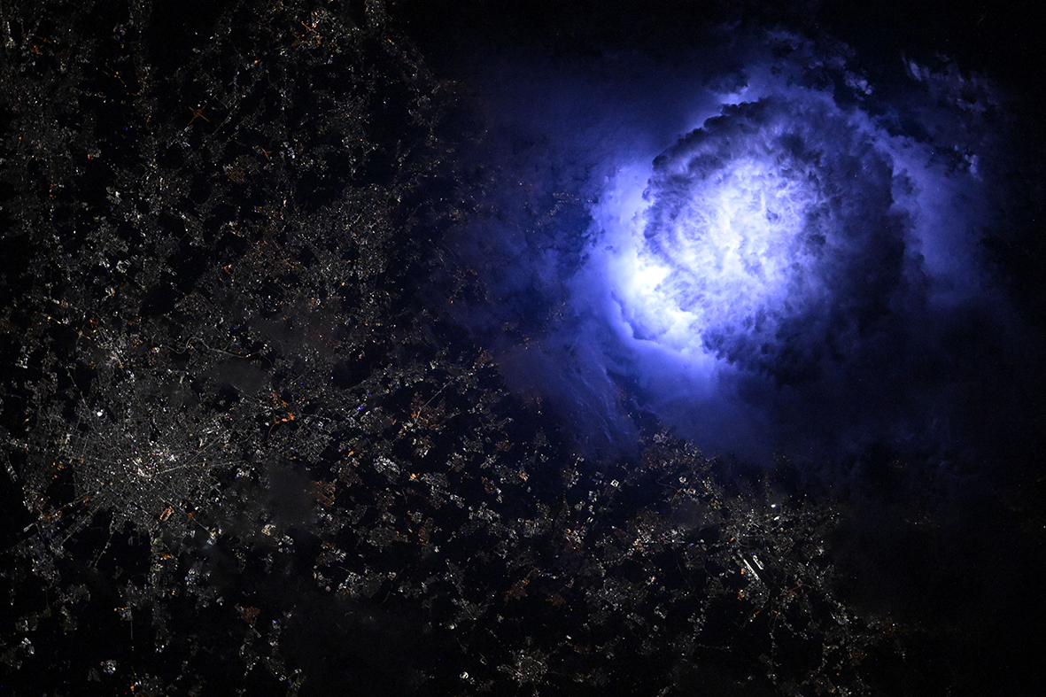 Another Nichole Ayers photo – this time of lightning as seen from an unfamiliar angle. Image credit: NASA/Nichole Ayers