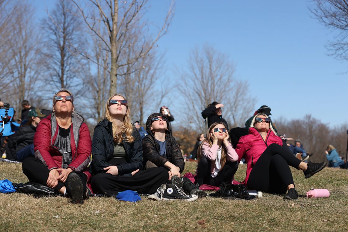 Eclipse chasers don eclipse glasses to see the April 8, 2024 total solar eclipse from Montreal, Quebec, Canada. Quebec will be one of the best places in North America to see the March 29, 2025 partial eclipse. Credit: Lokman Vural Elibol/Anadolu via Getty Images