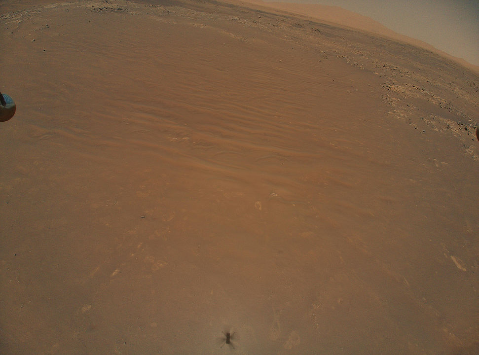Ingenuity helicopter spots Perseverance from the air Perseverance Mars rover, 4 August 2021 IMAGE CREDIT: NASA/JPL-Caltech