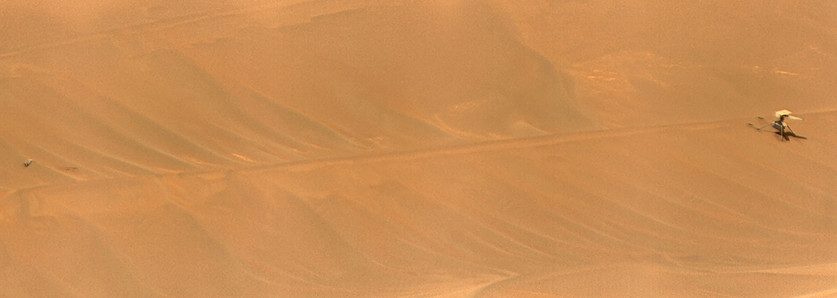 NASA’s Ingenuity Mars Helicopter can be seen on the right of this image. On the left, about 15 metres away, is one of its rotor blades. The image was captured by NASA's Perseverance rover on 24 February 2024. Credit: NASA/JPL-Caltech/LANL/CNES/CNRS