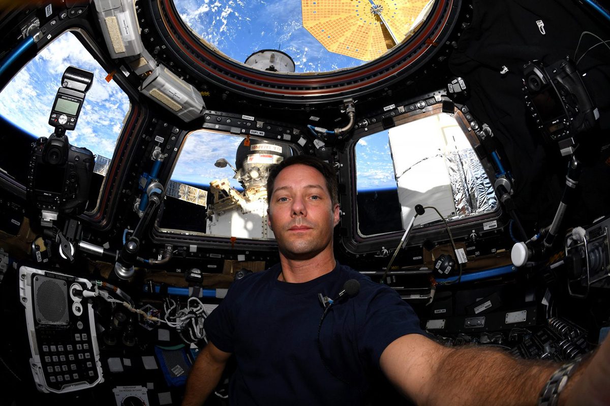 ESA astronaut Thomas Pesquet pictured at the Cupola on the International Space Station. Credit: ESA