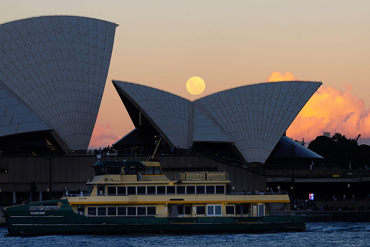 The 31st May Blue Moon rising over Sydney Opera House, Australia. Photo by Steve Christo - Corbis via Getty Images