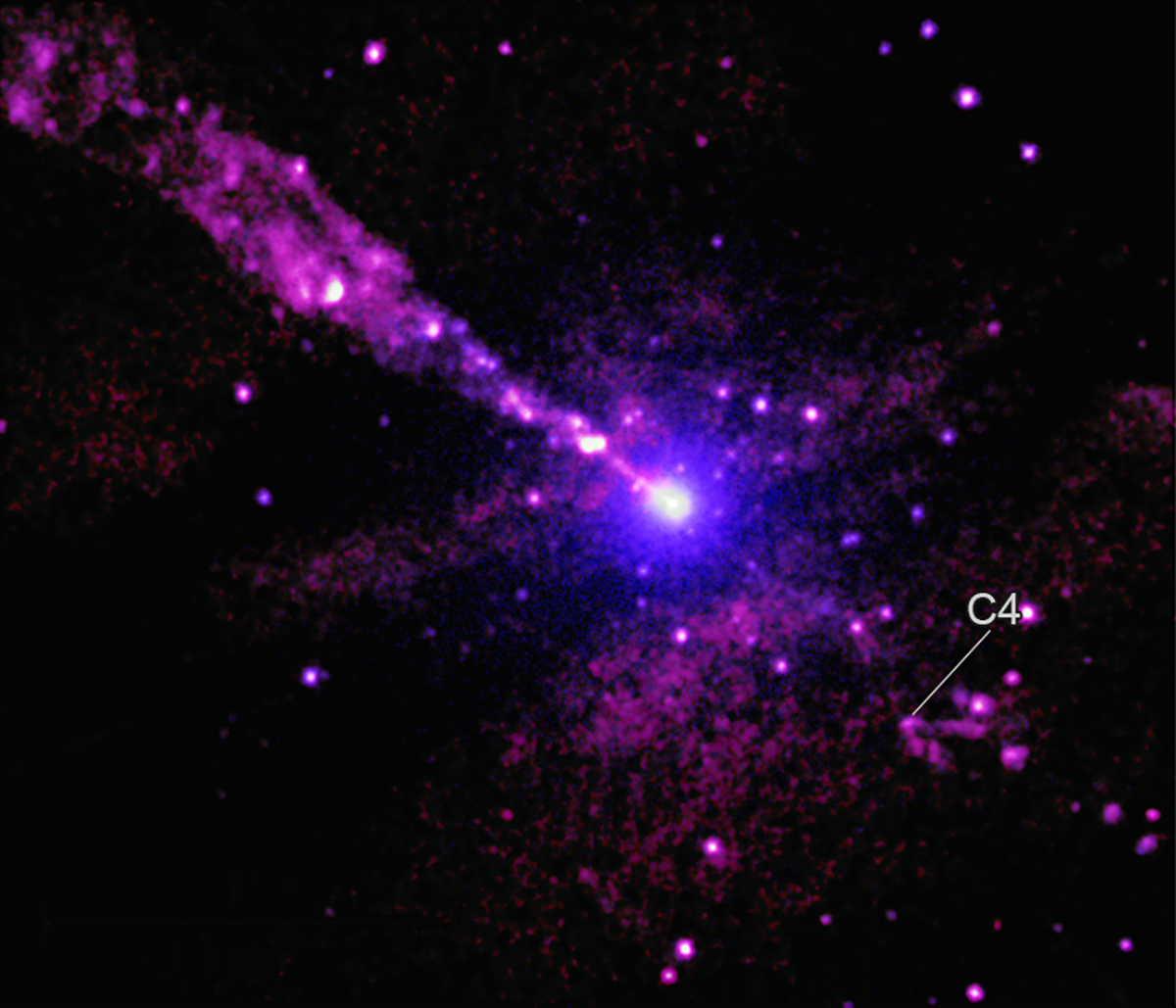 A strange V-shaped structure named C4 caused by a jet from a supermassive black hole at the centre of galaxy Centaurus A smashing into an unknown object. Credit: Main image: NASA/CXC/SAO/D. Bogensberger et al; Image Processing: NASA/CXC/SAO/N. Wolk; Wide field composite: X-ray (Chandra): NASA/CXC/SAO/D. Bogensberger et al; X-ray (IXPE): NASA/MSFC; Optical: ESO; Image Processing: NASA/CXC/SAO/N. Wolk