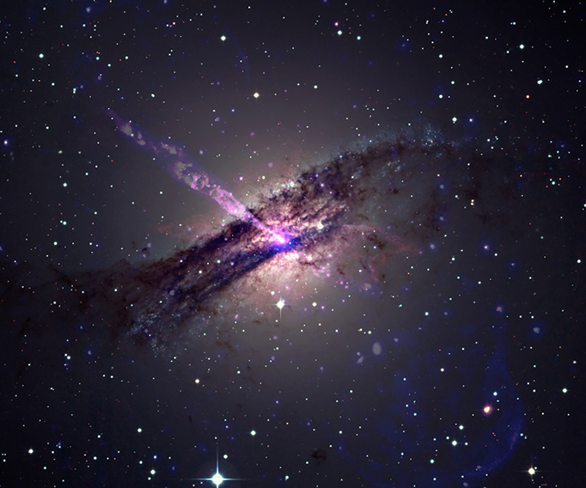 A strange V-shaped structure named C4 caused by a jet from a supermassive black hole at the centre of galaxy Centaurus A smashing into an unknown object. Credit: Main image: NASA/CXC/SAO/D. Bogensberger et al; Image Processing: NASA/CXC/SAO/N. Wolk; Wide field composite: X-ray (Chandra): NASA/CXC/SAO/D. Bogensberger et al; X-ray (IXPE): NASA/MSFC; Optical: ESO; Image Processing: NASA/CXC/SAO/N. Wolk