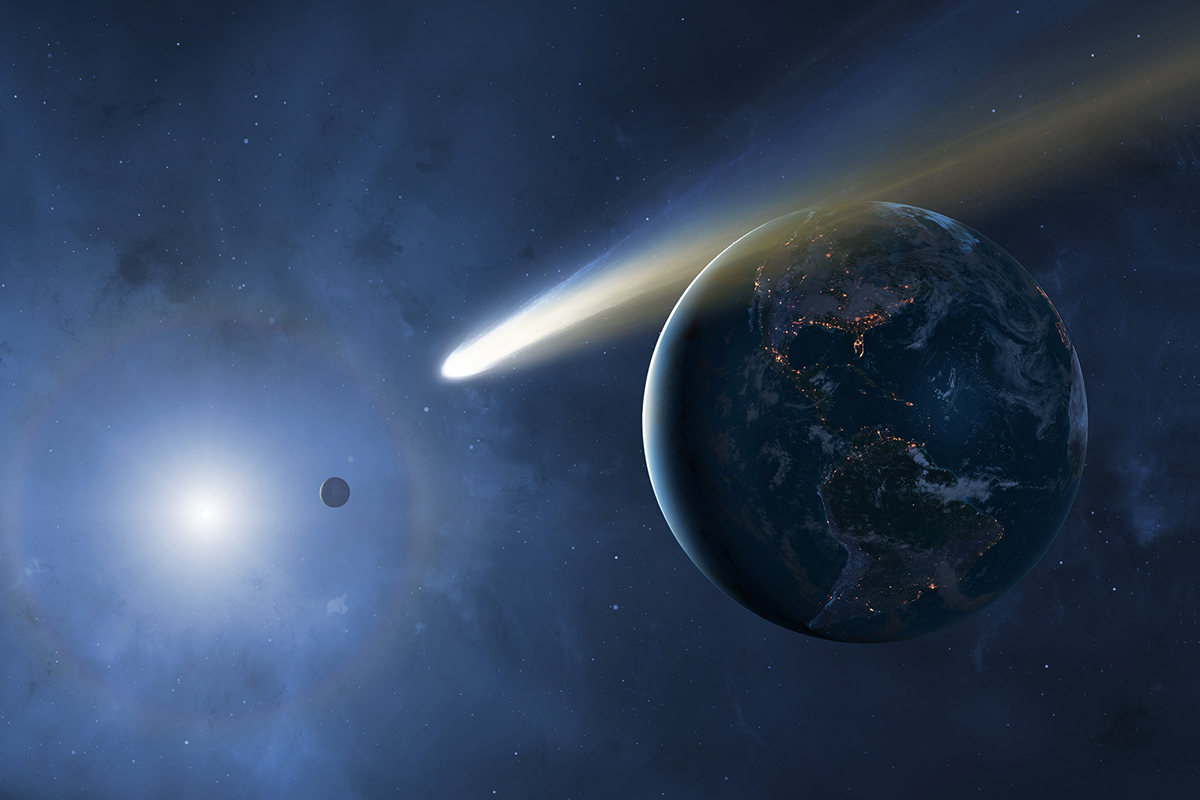 Artist's impression of a comet whizzing by Earth. Credit: Mark Garlick / Science Photo Library / Getty Images