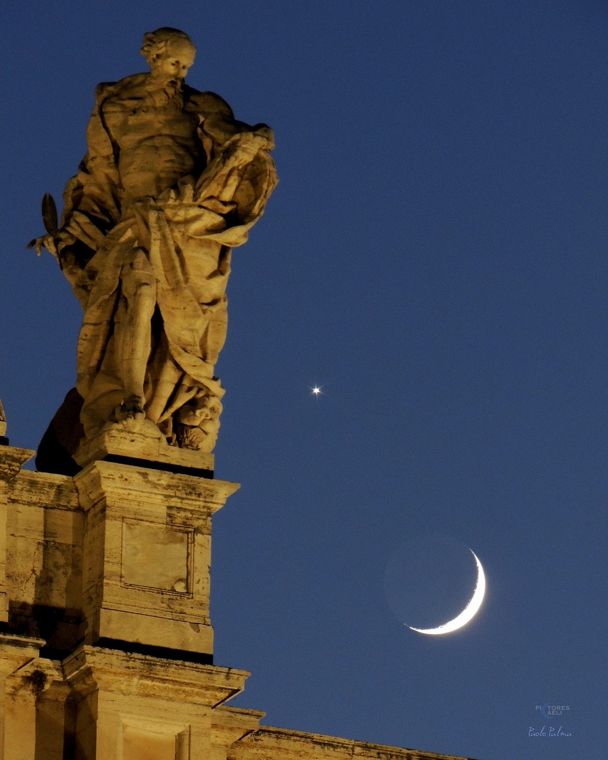 Paolo Palma captured this view of Venus and the crescent Moon over the statue of on the Basilica of San Giovanni in Laterano, Rome, Italy. Paolo says: "The statue, with a lion at its feet and a quill in its hands, is that of St Jerome, situated at the top of the façade of the Basilica of St John Lateran. "His gaze of wonder, directed towards the book he holds in his hands, seems perfectly in line with the two celestial bodies, as if marvelling at their beauty."