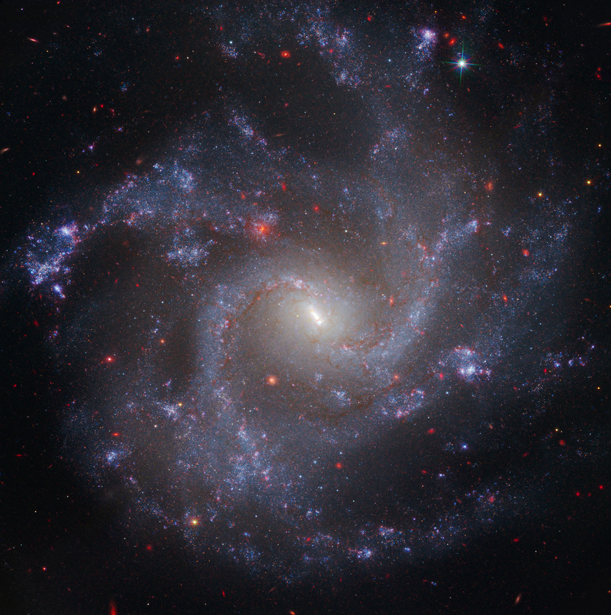 Image of galaxy NGC 5468, 130 million lightyears from Earth, combining data from the Hubble and James Webb space telescopes. It's the farthest galaxy in which Hubble identified Cepheid variable stars, markers for measuring the expansion rate of the universe. Credit: NASA, ESA, CSA, STScI, Adam G. Riess (JHU, STScI)