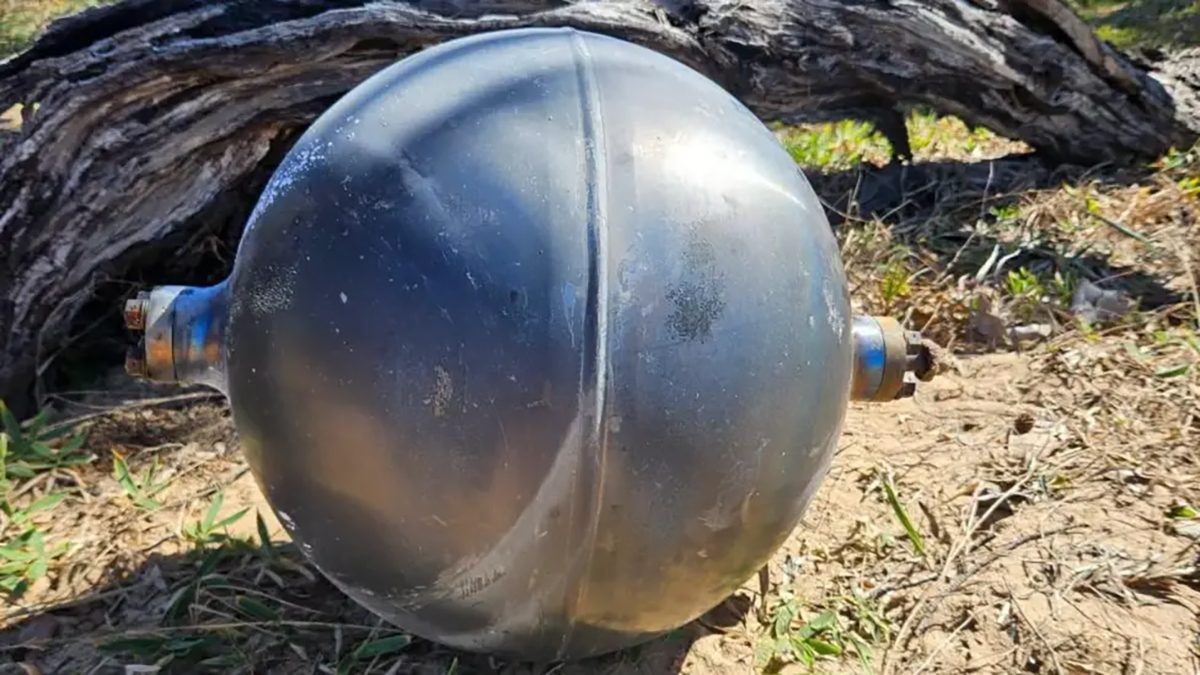 Strange space balls found on the beaches of north Queensland in July 2026 could be rocket debris. Credit: Queensland Fire Department