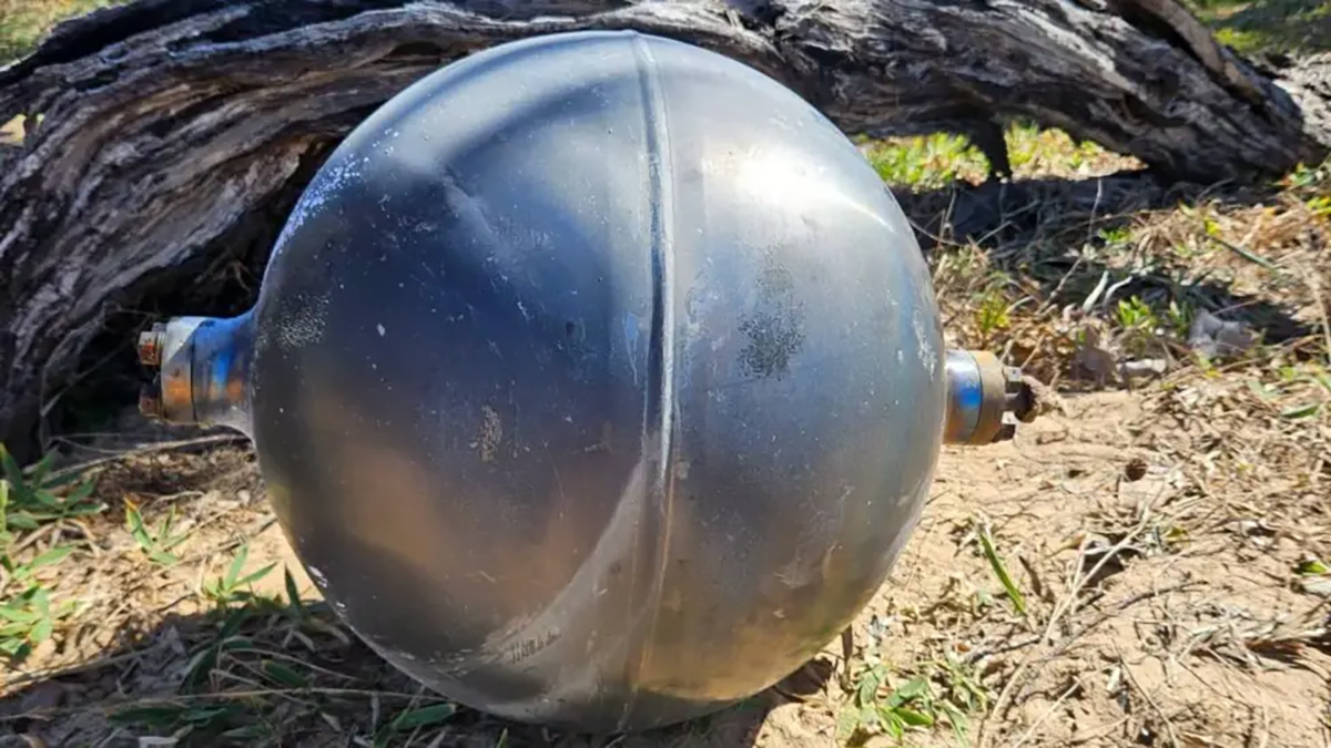 Strange space balls found on the beaches of north Queensland in July 2026 could be rocket debris. Credit: Queensland Fire Department