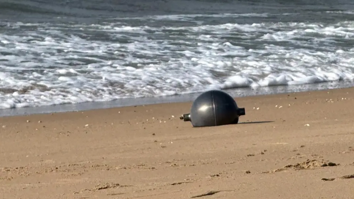 Strange space balls found on the beaches of north Queensland in July 2026 could be rocket debris. Credit: Queensland Fire Department