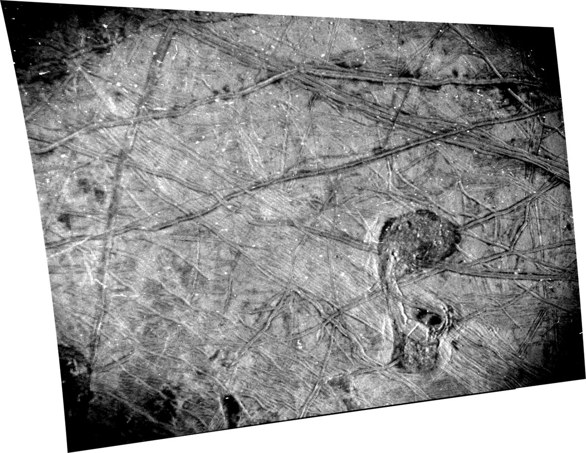 Image of the surface of Jupiter's mooon Europa captured by the Stellar Reference Unit on NASA's Juno spacecraft, 29 September 2022. Top right can be seen double ridges and dark stains that could indicate plumes activity. Bottom right is a feature nicknamed the 'Platypus'. Credit: NASA/JPL-Caltech/SwRI