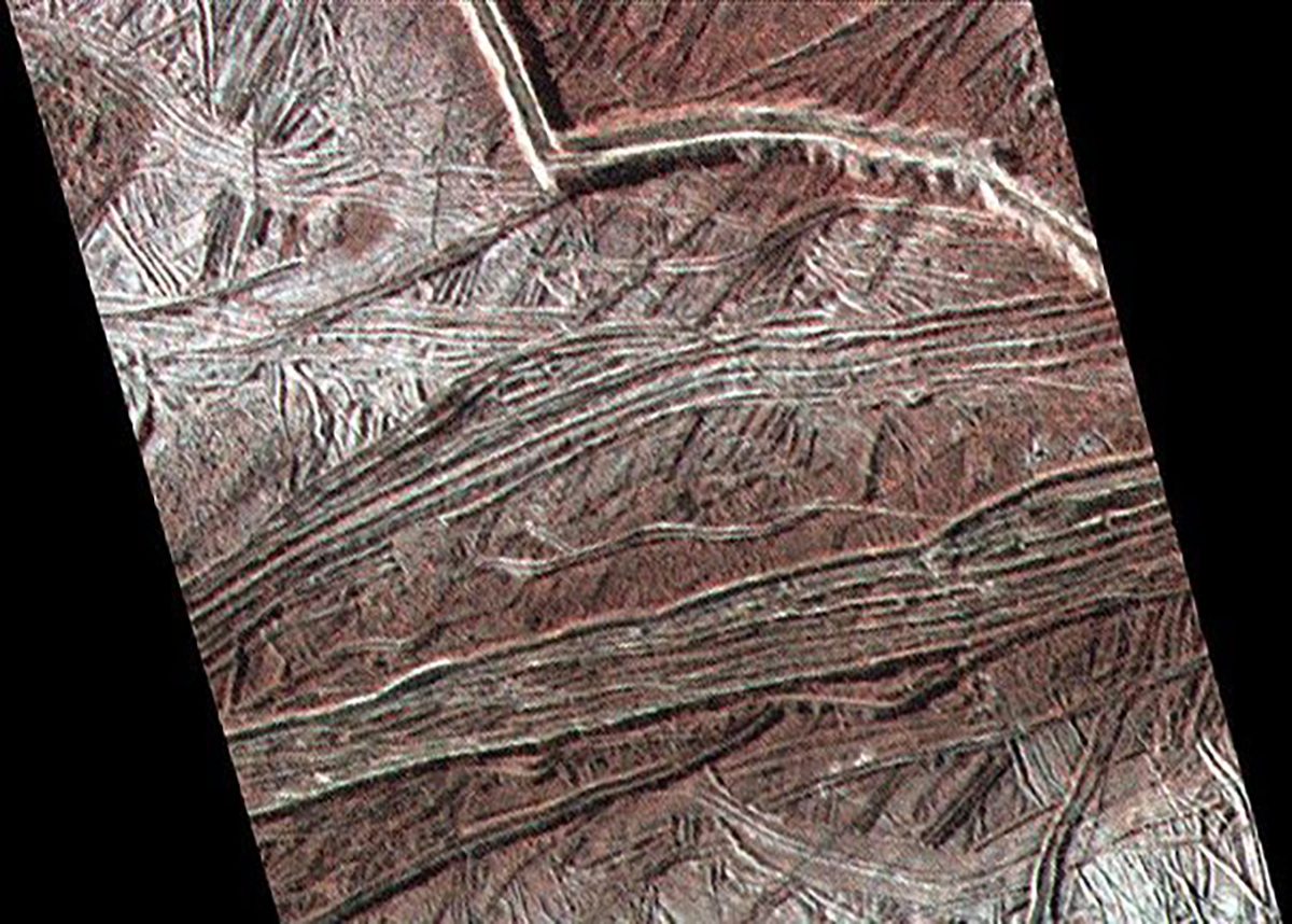 Cracks and ridges on Europa's surface captured by NASA's Galileo spacecraft on 2 February 1999. Credit: NASA/JPL-Caltech/Cynthia Phillips